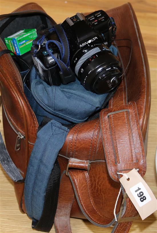 A Minolta camera, lenses etc